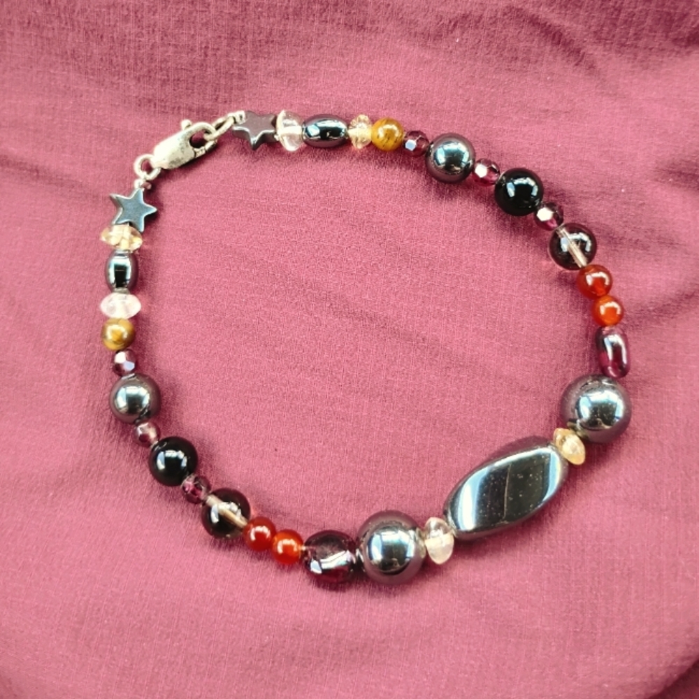 Elegant Multicolor Beaded Bracelet With A Fastener And Hematite Accents